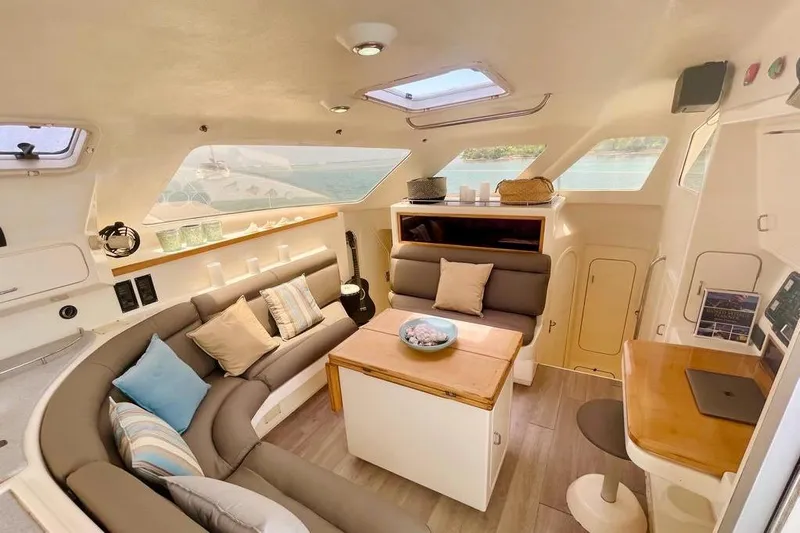  Yacht Photos Pics Luxurious interior of 1998 Voyager Norseman 430 yacht with cozy seating and modern decor.