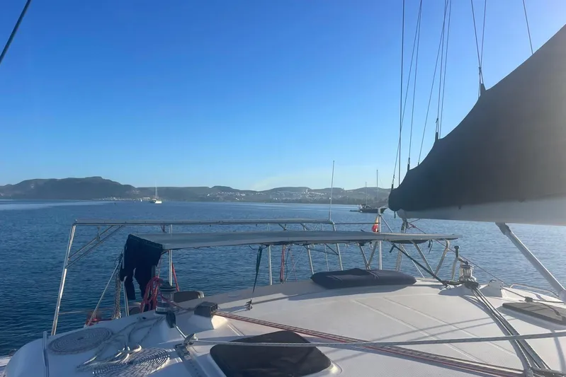  Yacht Photos Pics Sailing on a 1998 Voyager Norseman 430 yacht with scenic coastal view.