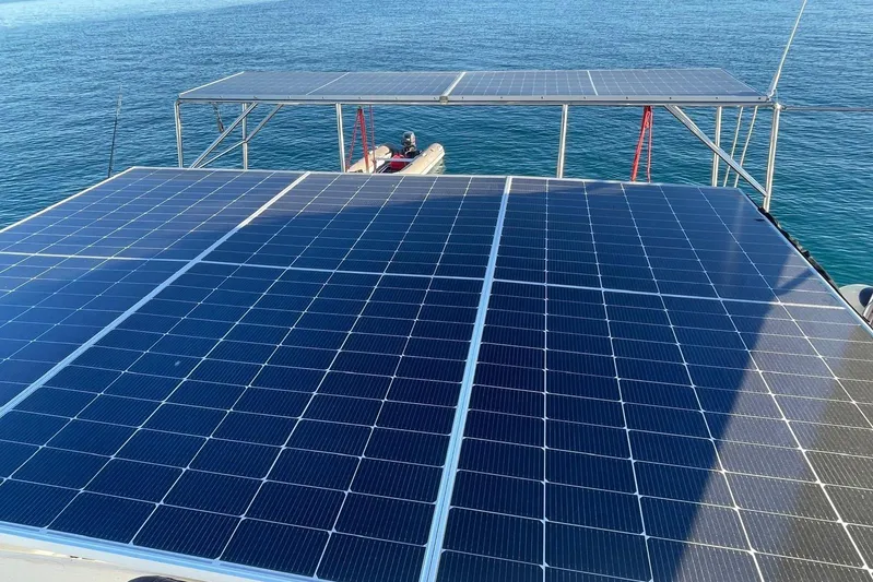  Yacht Photos Pics Solar panels on Voyager Norseman 430 yacht, 1998 model, with ocean backdrop.