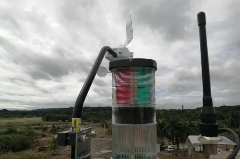  Yacht Photos Pics Aviation light with antennas against cloudy sky, Voyager Norseman 430, 1998 model.