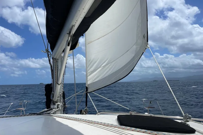  Yacht Photos Pics Sailing on a 1998 Voyager Norseman 430 yacht under clear blue skies.