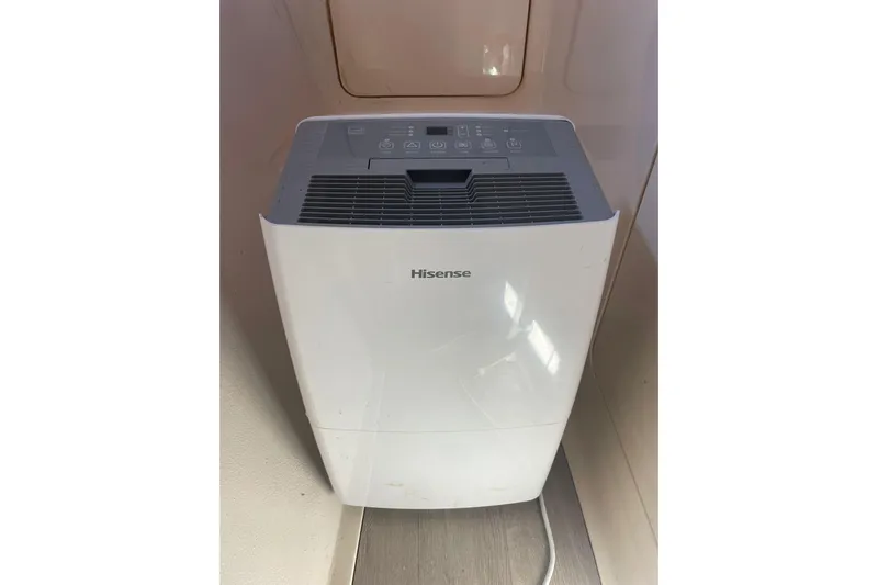  Yacht Photos Pics White Hisense dehumidifier inside Voyager Norseman 430, 1998 model.