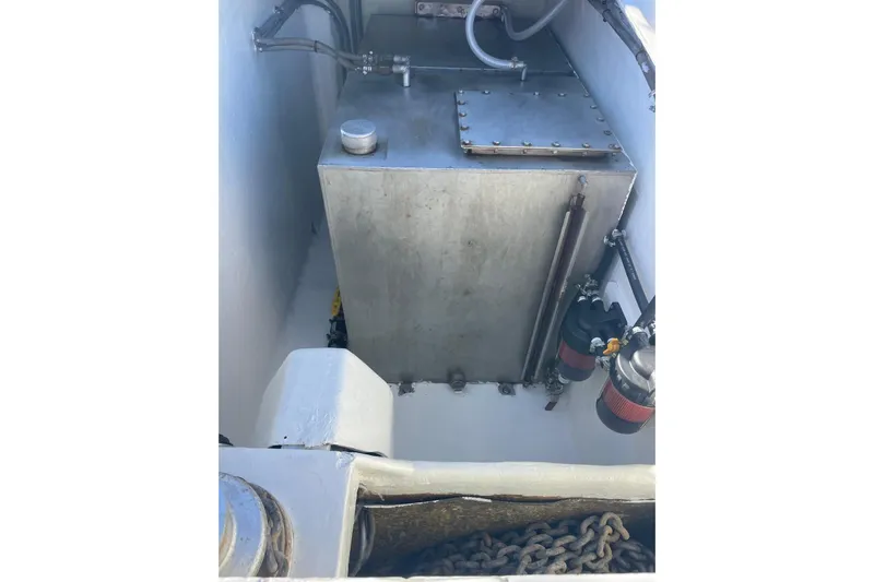  Yacht Photos Pics Engine compartment of 1998 Voyager Norseman 430 boat with metal tank and filters.