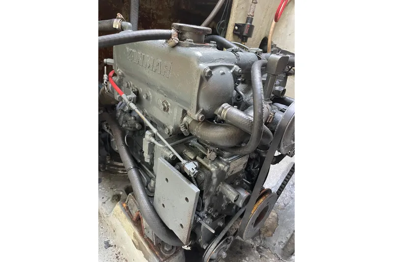  Yacht Photos Pics Engine of a 1998 Voyager Norseman 430 boat, featuring visible hoses and components.