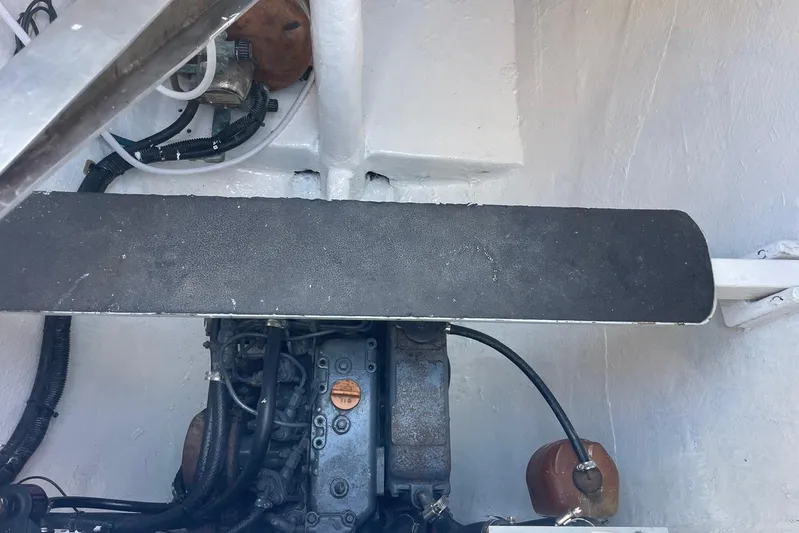  Yacht Photos Pics Engine compartment of a 1998 Voyager Norseman 430 boat, showing mechanical components and wiring.