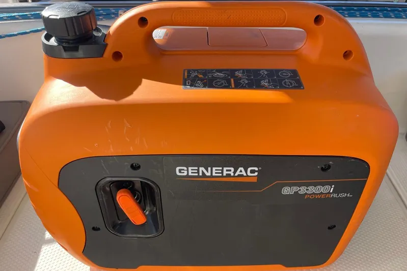  Yacht Photos Pics Orange Generac GP3300i PowerRush portable generator on Voyager Norseman 430, 1998 model.
