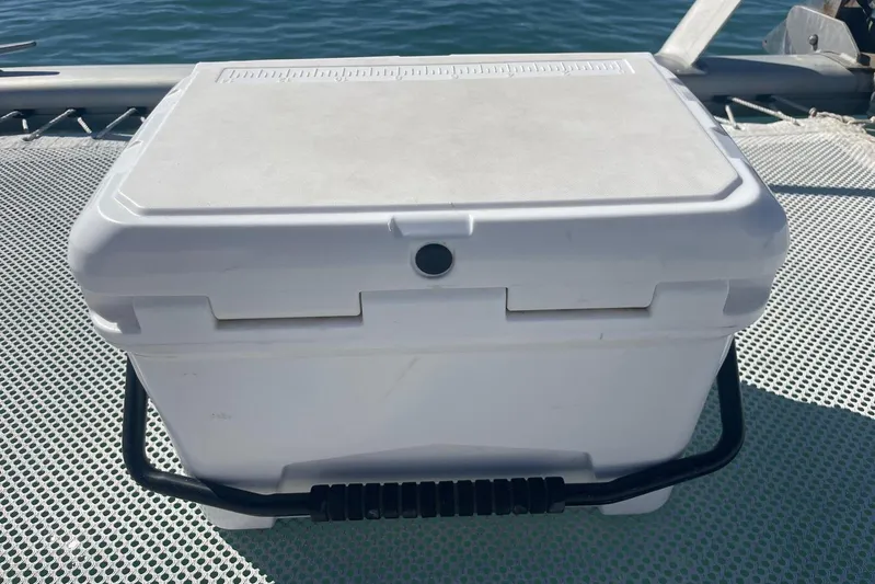  Yacht Photos Pics White cooler on Voyager Norseman 430 boat deck, 1998 model, under sunny skies.