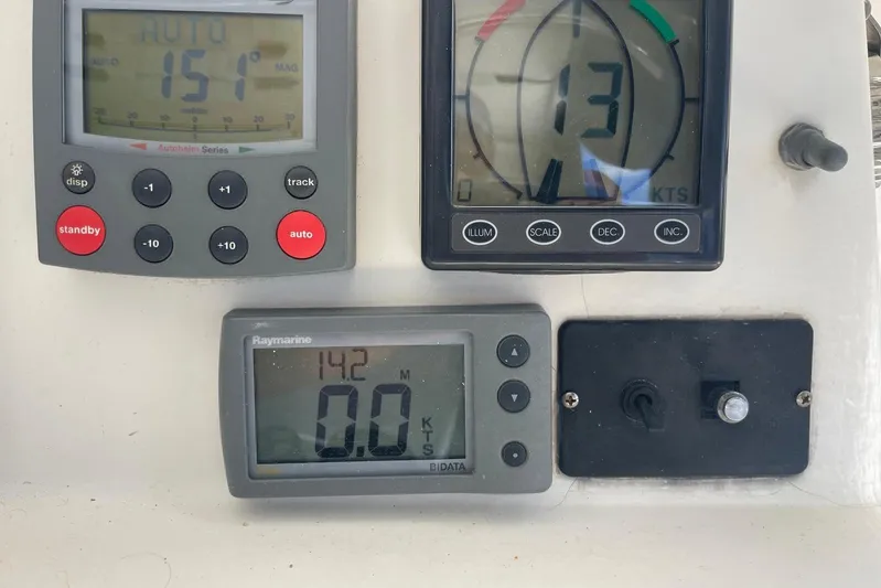  Yacht Photos Pics Control panel of 1998 Voyager Norseman 430 with navigation instruments and displays.