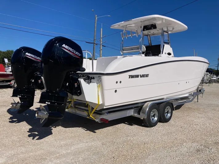  Yacht Photos Pics 2025 Twin Vee 260STX boat with dual Mercury engines on a trailer.