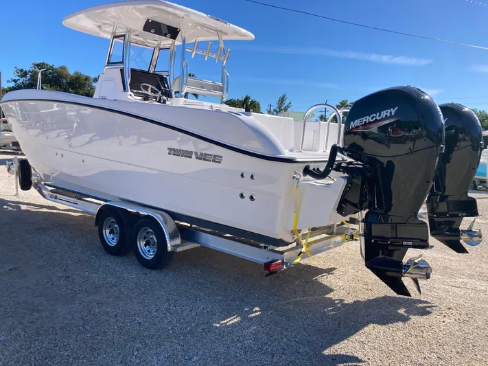  Yacht Photos Pics 2025 Twin Vee 260STX boat with dual Mercury engines on a trailer.