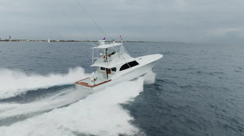 Sea Angel Yacht Photos Pics 1980 Scarborough 46 Convertible yacht cruising on open water.