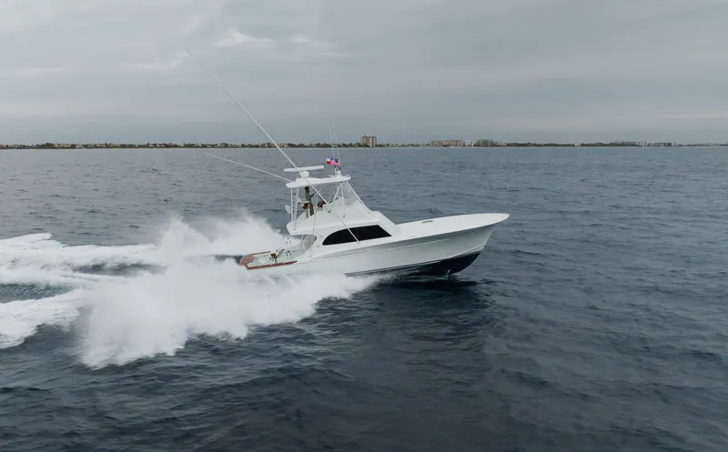 Sea Angel Yacht Photos Pics 1980 Scarborough 46 Convertible yacht cruising on open water.