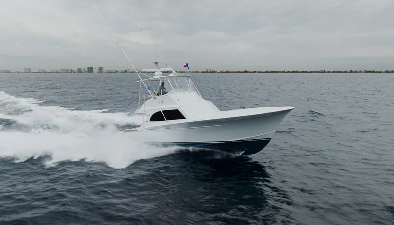 Sea Angel Yacht Photos Pics 1980 Scarborough 46 Convertible yacht cruising on open water.