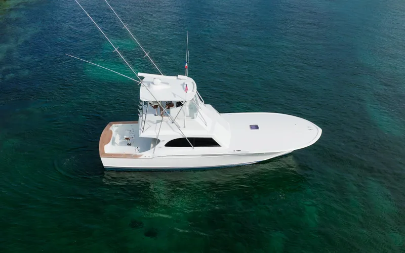 Sea Angel Yacht Photos Pics 1980 Scarborough 46 Convertible yacht on clear blue water.