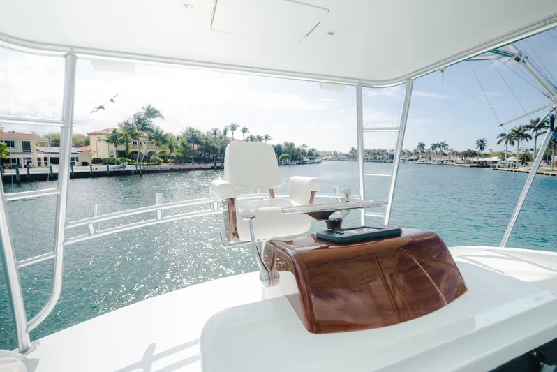 Sea Angel Yacht Photos Pics 1980 Scarborough 46 Convertible yacht helm with waterfront view.