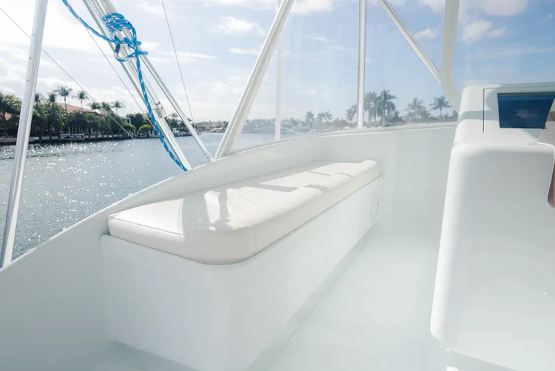 Sea Angel Yacht Photos Pics 1980 Scarborough 46 Convertible yacht interior with white seating and waterfront view.