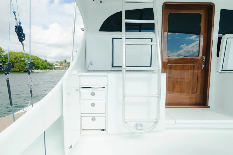 Sea Angel Yacht Photos Pics 1980 Scarborough 46 Convertible yacht deck with ladder and wooden door.