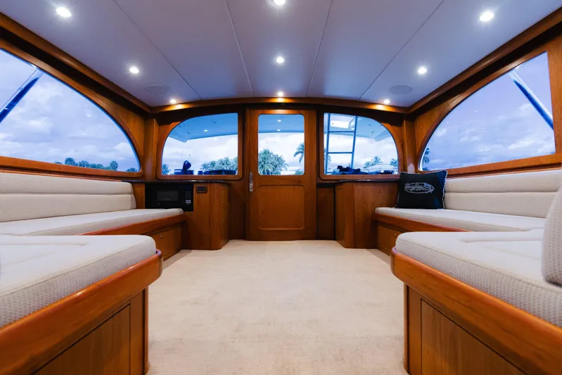Sea Angel Yacht Photos Pics Interior of 1980 Scarborough 46 Convertible yacht with elegant wood finish and plush seating.