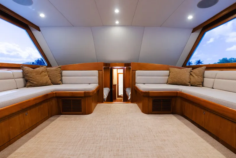 Sea Angel Yacht Photos Pics Interior of 1980 Scarborough 46 Convertible yacht with plush seating and elegant wood finish.