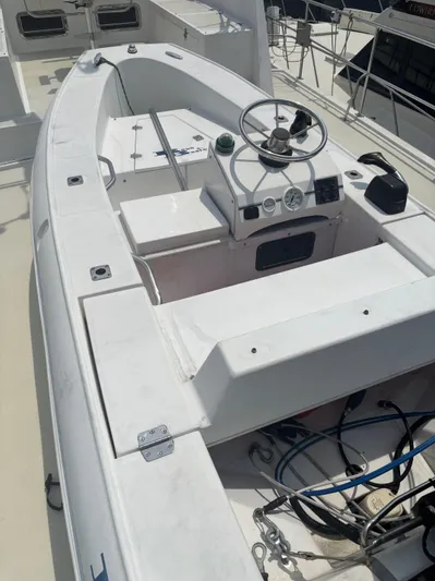 Almost Perfect Yacht Photos Pics 2006 Kadey-Krogen North Sea Widebody boat deck with steering wheel and controls.