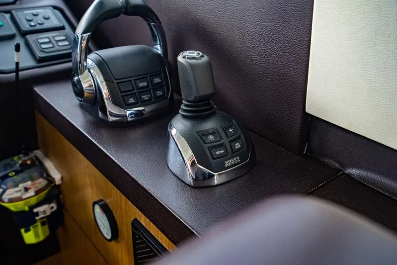 The Royal Blue Yacht Photos Pics Beneteau Gran Turismo 49 yacht controls, 2015 model, featuring joystick and throttle.