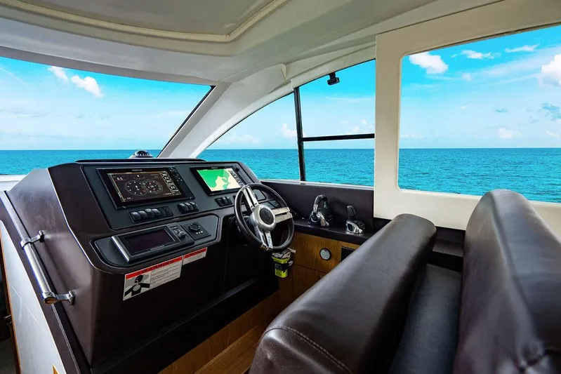 The Royal Blue Yacht Photos Pics Interior of 2015 Beneteau GRAN TURISMO 49 yacht with ocean view.