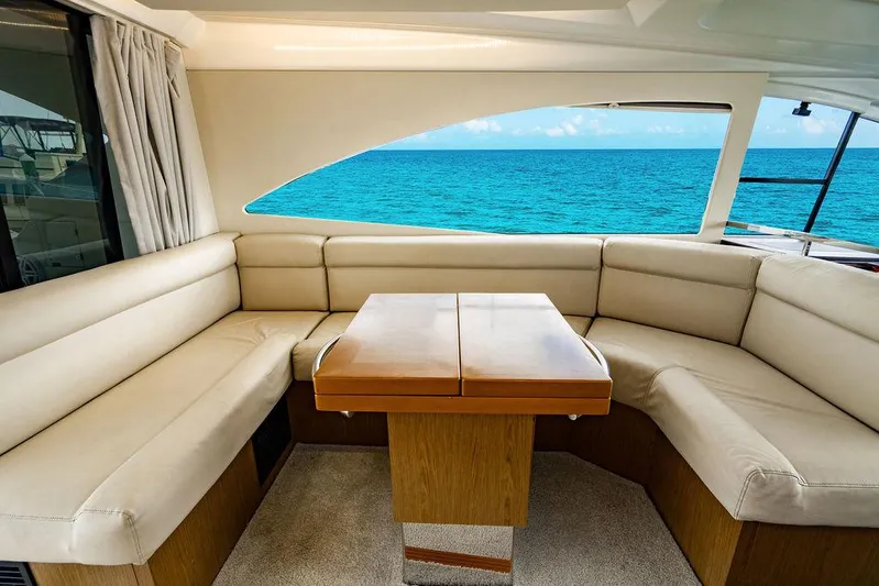 The Royal Blue Yacht Photos Pics Luxurious interior of 2015 Beneteau GRAN TURISMO 49 yacht with ocean view.