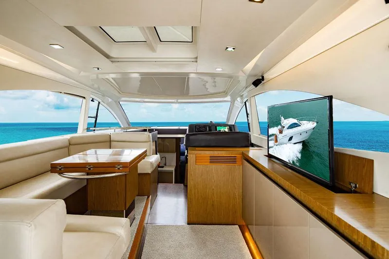 The Royal Blue Yacht Photos Pics Luxurious interior of 2015 Beneteau Gran Turismo 49 yacht with ocean view.