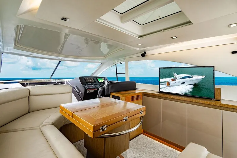 The Royal Blue Yacht Photos Pics Luxurious interior of 2015 Beneteau Gran Turismo 49 yacht with ocean view.