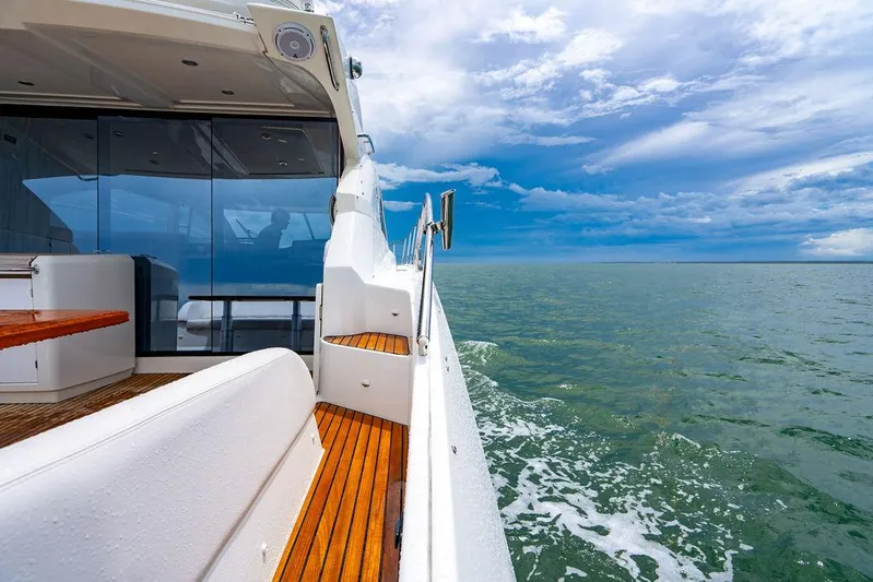 The Royal Blue Yacht Photos Pics Beneteau GRAN TURISMO 49 yacht cruising on open water, 2015 model.