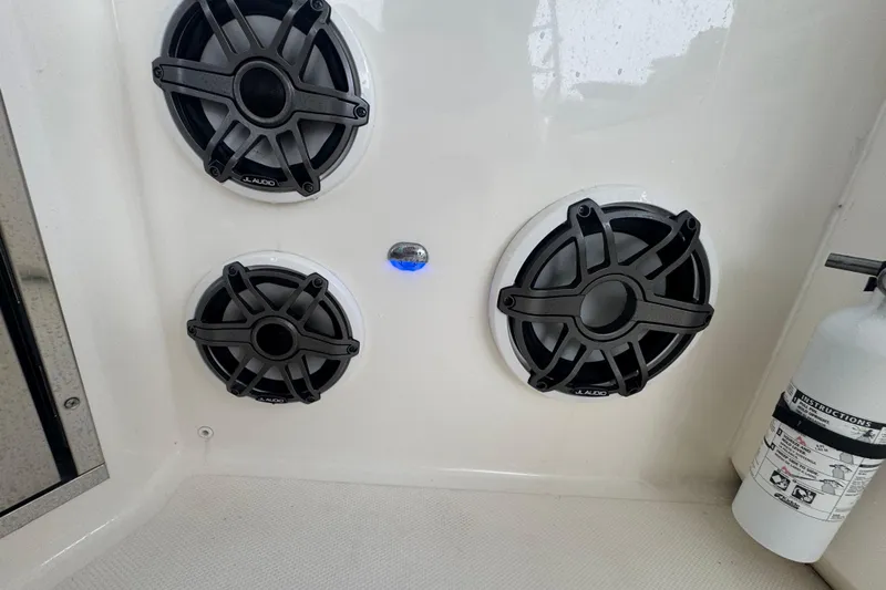  Yacht Photos Pics Speakers and fire extinguisher on 2022 Boston Whaler 350 Realm boat interior.