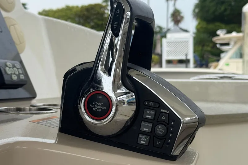  Yacht Photos Pics Control panel of a 2022 Boston Whaler 350 Realm boat, featuring engine start-stop button.