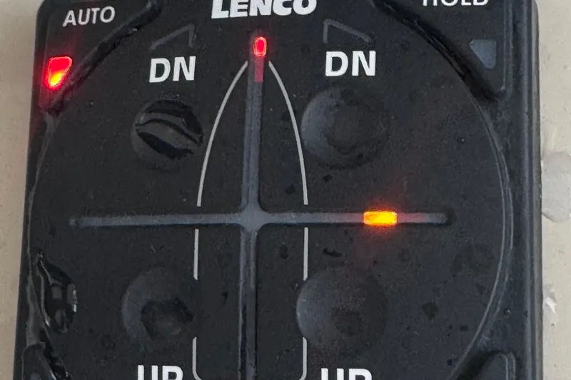  Yacht Photos Pics Lenco control panel on 2022 Boston Whaler 350 Realm boat, showing trim tab adjustments.