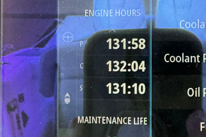  Yacht Photos Pics Display showing engine hours and maintenance life for 2022 Boston Whaler 350 Realm.