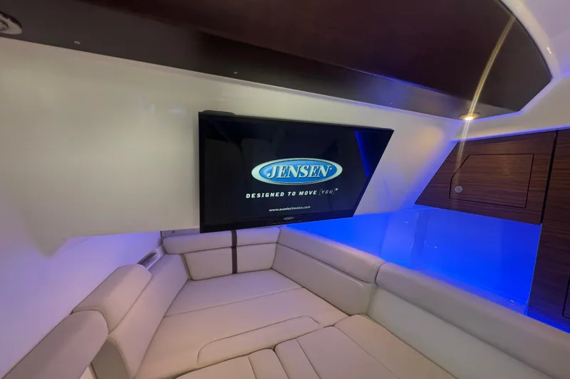  Yacht Photos Pics Luxurious interior of 2022 Boston Whaler 350 Realm with Jensen TV and ambient lighting.