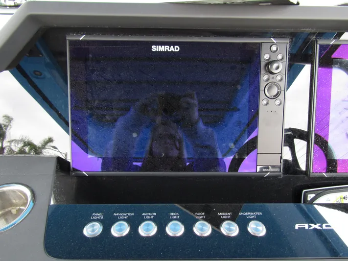  Yacht Photos Pics Simrad display and controls on 2024 Axopar 37 Sun Top boat dashboard.