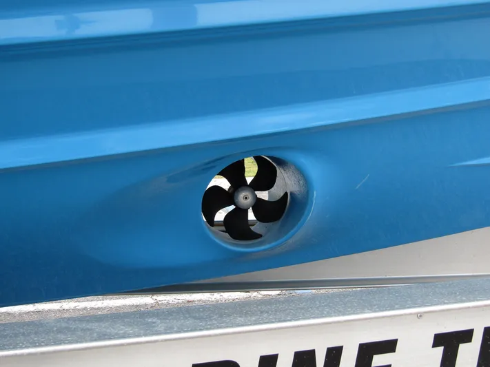  Yacht Photos Pics Close-up of a blue 2024 Axopar 37 Sun Top boat thruster.