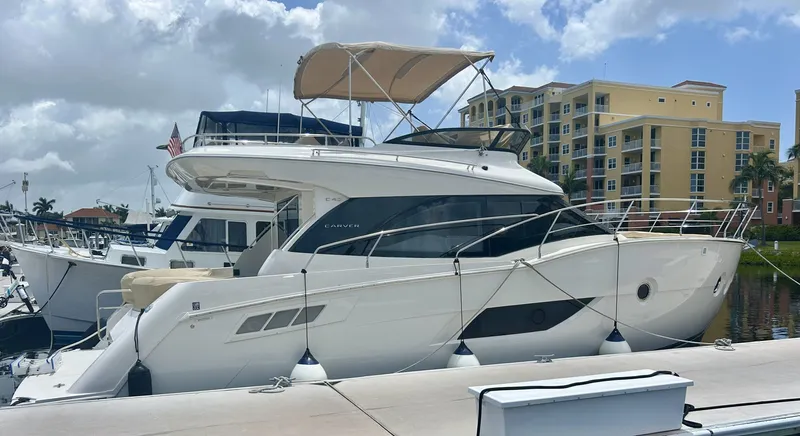  Yacht Photos Pics 2014 Carver C40 yacht docked at marina, sunny day.