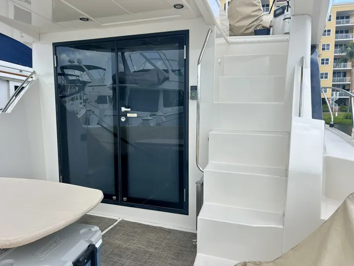  Yacht Photos Pics Carver C40 Yacht 2014 with stairs and glass door.