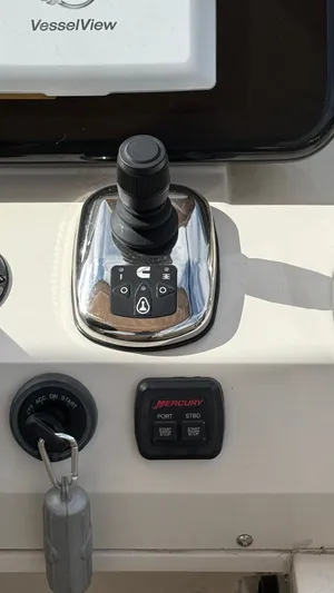  Yacht Photos Pics Control console of a 2014 Carver C40 with joystick and controls.