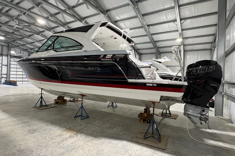  Yacht Photos Pics 2023 Formula 400 Super Sport Crossover boat in storage facility.