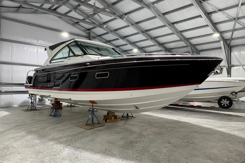  Yacht Photos Pics 2023 Formula 400 Super Sport Crossover boat in storage facility.