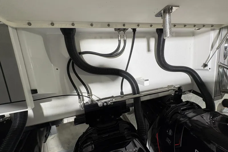  Yacht Photos Pics Engine compartment of 2023 Formula 400 Super Sport Crossover with visible hoses and components.