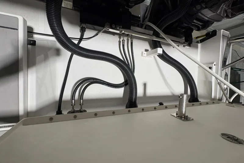  Yacht Photos Pics Engine compartment of 2023 Formula 400 Super Sport Crossover with visible hoses and fittings.