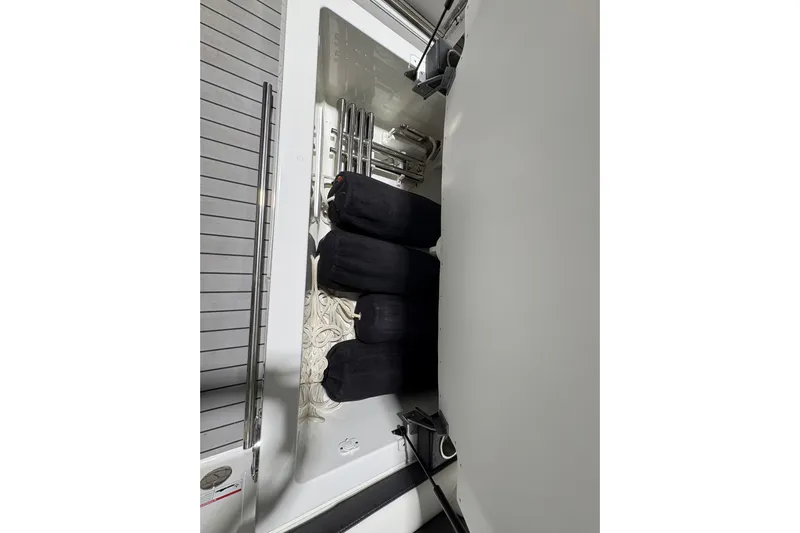  Yacht Photos Pics Storage compartment in 2023 Formula 400 Super Sport Crossover boat, featuring neatly organized equipment.