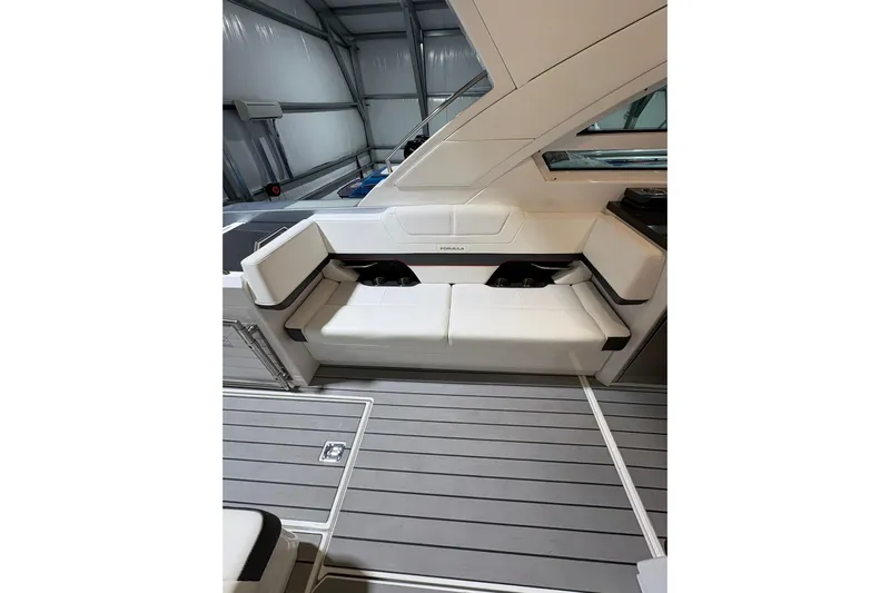  Yacht Photos Pics 2023 Formula 400 Super Sport Crossover interior with sleek white seating and modern design.