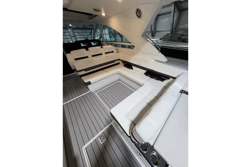  Yacht Photos Pics 2023 Formula 400 Super Sport Crossover interior with luxurious white seating and sleek design.