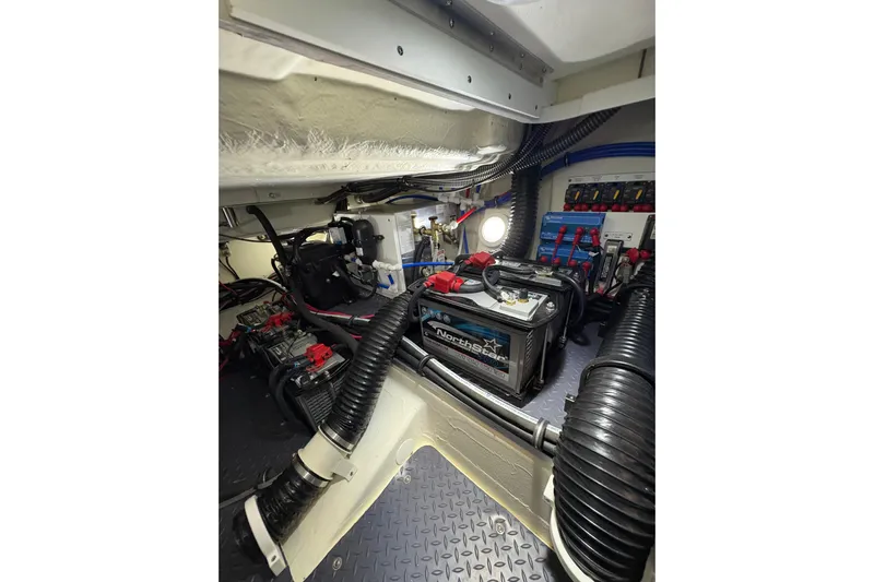  Yacht Photos Pics Engine room of 2023 Formula 400 Super Sport Crossover with batteries and wiring.