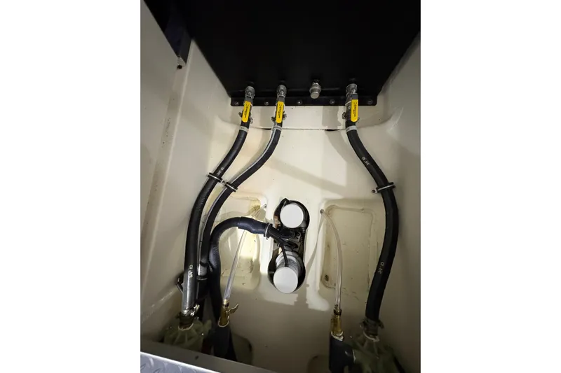  Yacht Photos Pics Engine compartment of 2023 Formula 400 Super Sport Crossover with visible hoses and fittings.