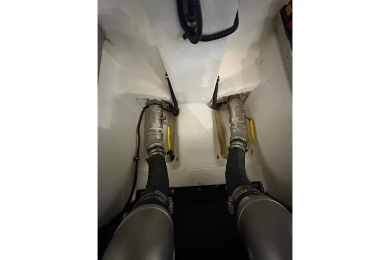  Yacht Photos Pics Engine compartment of 2023 Formula 400 Super Sport Crossover with visible hoses and fittings.